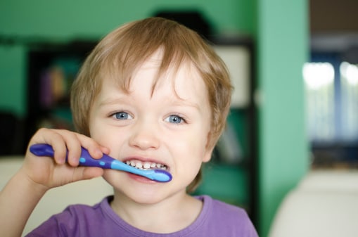 Little boy brushing teeth.jpg